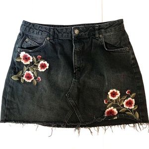 black denim skirt w/ formal patches